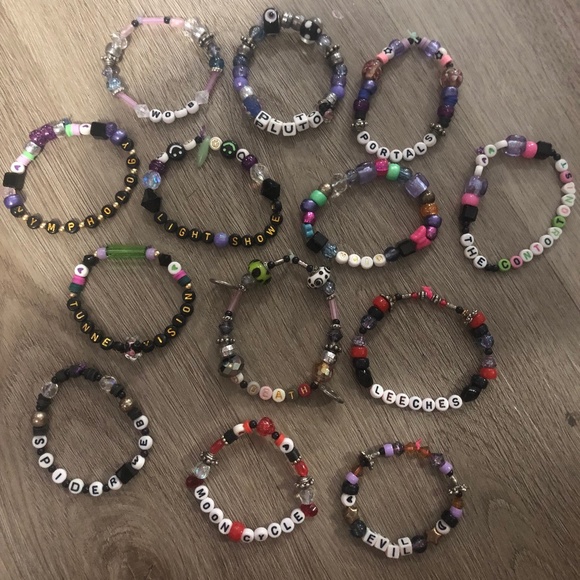 Set of 13 “Portals” Melanie Martinez Trilogy tour bracelet set - Picture 1 of 3